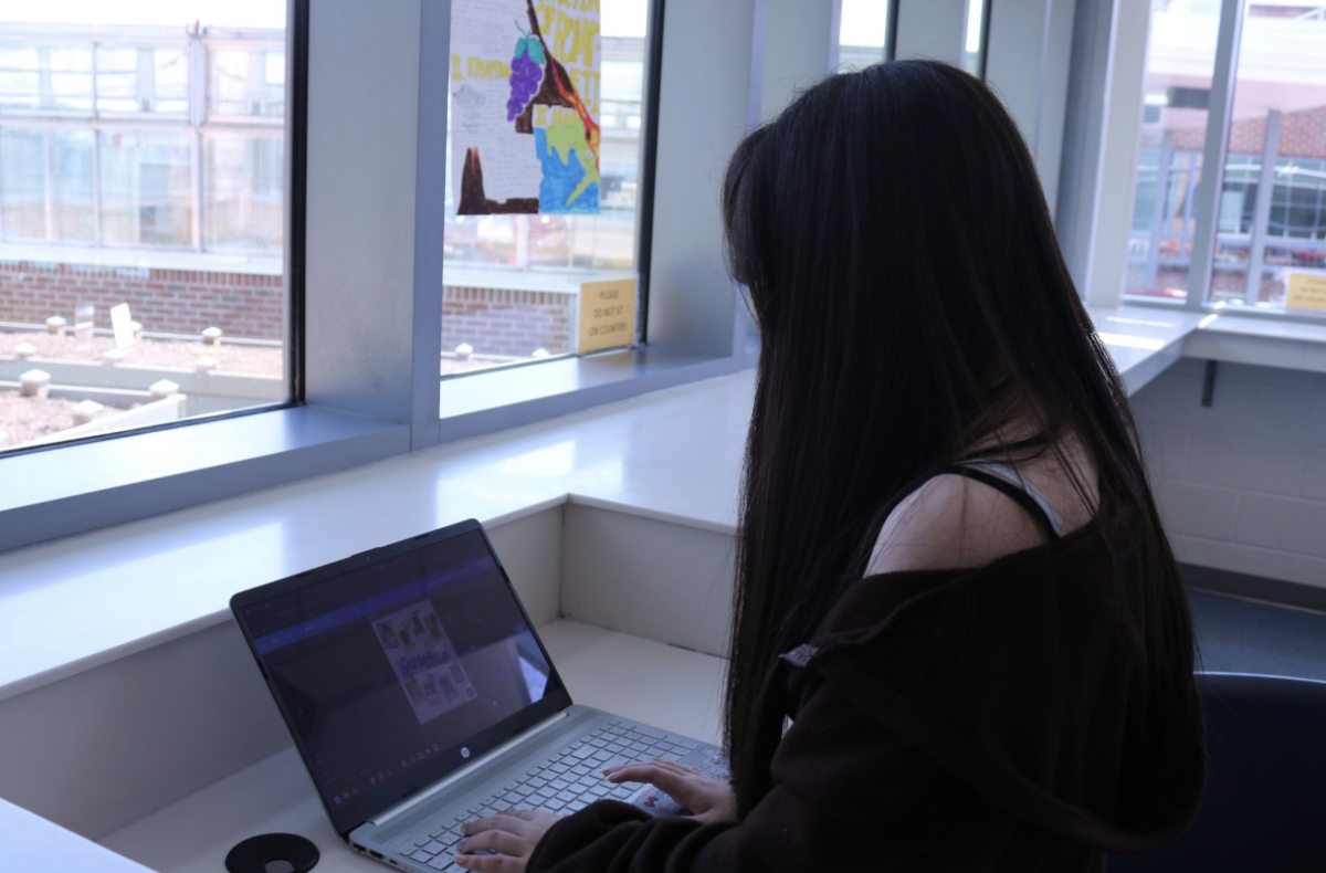 Freshman Communications Specialist Sabrina Lee works on a post for the Jefferson Student Government Association (SGA) Instagram account. “ExComm is a big part of my life now,” Lee said. “I have to do things that are related to ExComm every day. And I believe that, even if it is a lot of work, it's good work.”