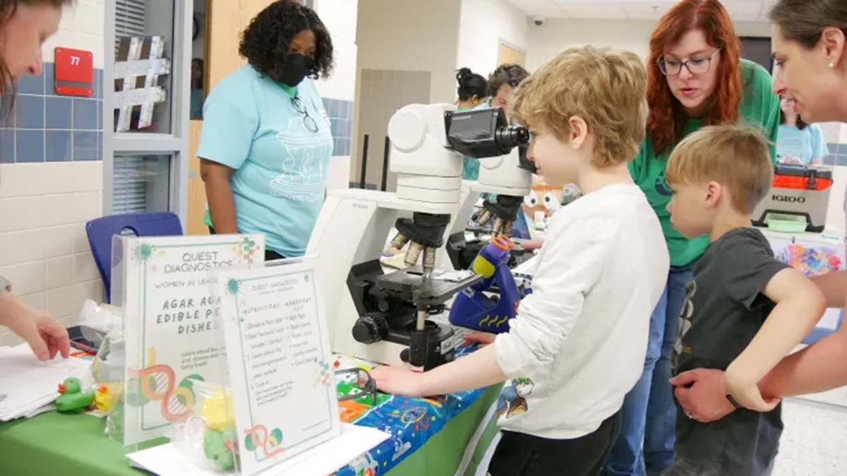 Exploring through the building, students from Title I schools move from exhibit to exhibit during Techstravaganza on Saturday, May 16. “We get kids from elementary schools every year [at Techstravaganza]. The most rewarding part of [Techstravagnaza] is seeing their happy faces as they engage in different STEM activities,” senior and TWIST co-president Rayna Kim said. “Some of these Titles I [schools] don't have very strong STEM programs. [Having them] come to Jefferson [to] look at all the cool things Jefferson has to offer, that's really rewarding.”